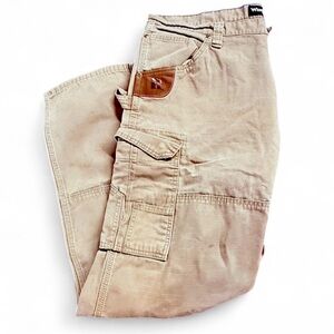 Men’s Wrangler RIGGS tan cargo work pants with a relaxed fit size 40x32